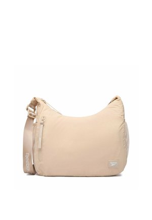 Béžová kabelka přes rameno značky Reebok s nastavitelným páskem, předním kapsou na zip, boční síťovanou kapsou a značkovou nášivkou v pravém dolním rohu.