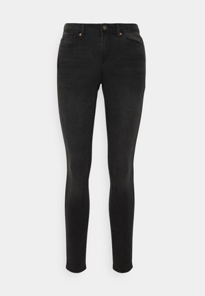 Schwarze Skinny-Jeans aus Denim-Material. Verfügt über einen Knopf- und Reißverschluss, fünf Taschen und minimale Verfärbungen mit einer glatten Textur.