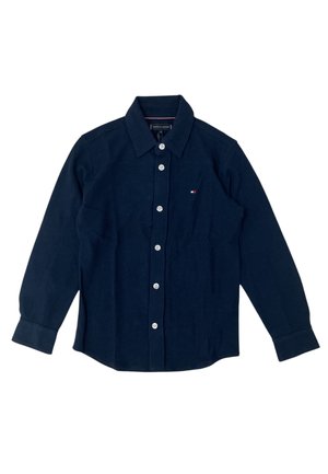 Camicia blu navy con bottoni in morbido tessuto, caratterizzata da un colletto classico, maniche lunghe e chiusure a bottone bianche. Piccolo logo applicato sul petto.
