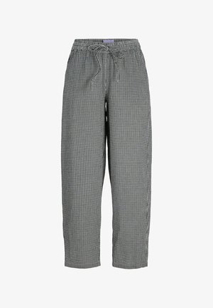 Juodos ir baltos spalvos languoti laisvo kirpimo kelnės su elastiniu liemeniu ir raišteliu, tiesios kojos, vidutinio aukščio liemuo.