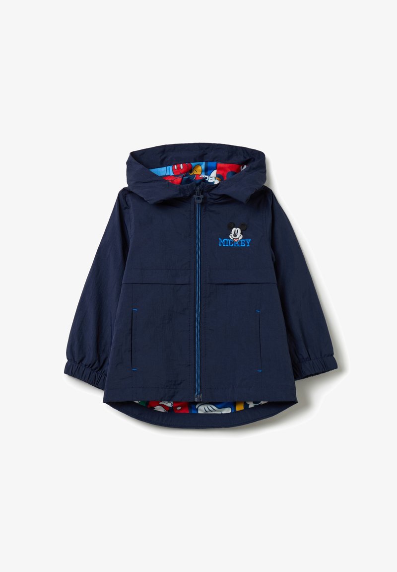 Veste légère bleu marine avec capuche, fermeture éclair sur le devant, deux poches et doublure à motifs colorés présentant des personnages de dessin animé.