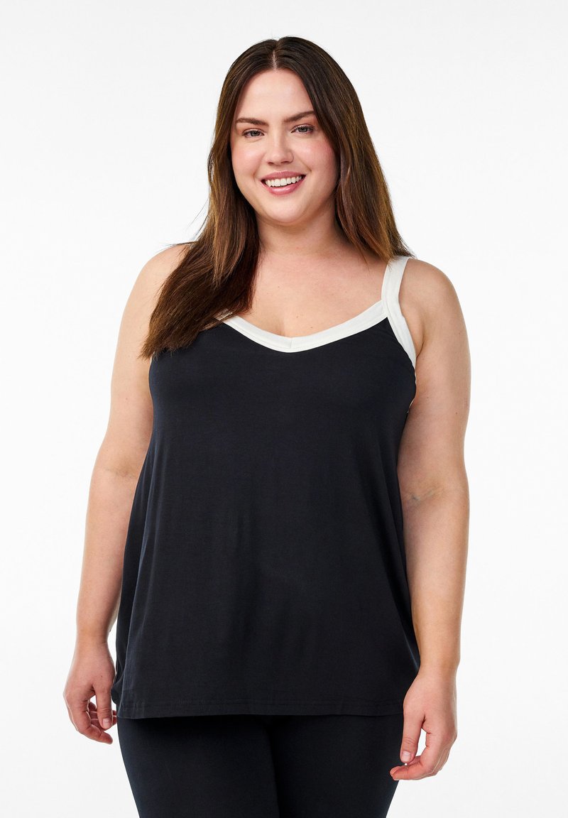 Zwarte tanktop met witte accenten, heeft een V-hals en brede bandjes. Gemaakt van een zachte stof met een losse pasvorm en een rechte zoom.