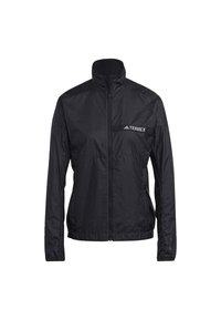 Veste légère noire zippée intégralement, col montant, manches longues et logo "TERREX" sur la poitrine gauche.