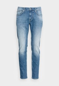 Light blue denim jeans with a straight-leg cut, featuring a faded texture, front pockets, and a single back pocket with a small label.