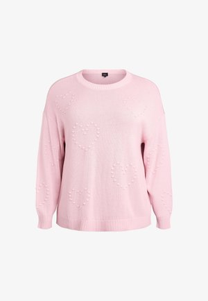 Pull rose clair en tricot avec motifs de cœurs en relief texturé, manches larges, col rond et ourlet côtelés.