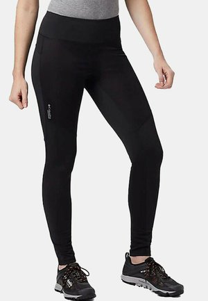 Schwarze Sportleggings mit hohem Bund, glatter Textur und figurbetontem Schnitt, ausgestattet mit einem Logo auf der linken Seite und Nahtakzenten.