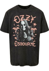 Tricou din bumbac negru cu un grafic frontal ce reprezintă o figură zâmbitoare cu păr lung, purtând ochelari de soare, înconjurată de lilieci și cu textul "Ozzy Osbourne."