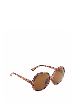Lunettes de soleil surdimensionnées à motif écaille de tortue avec des verres carrés arrondis marron et des branches assorties au motif.