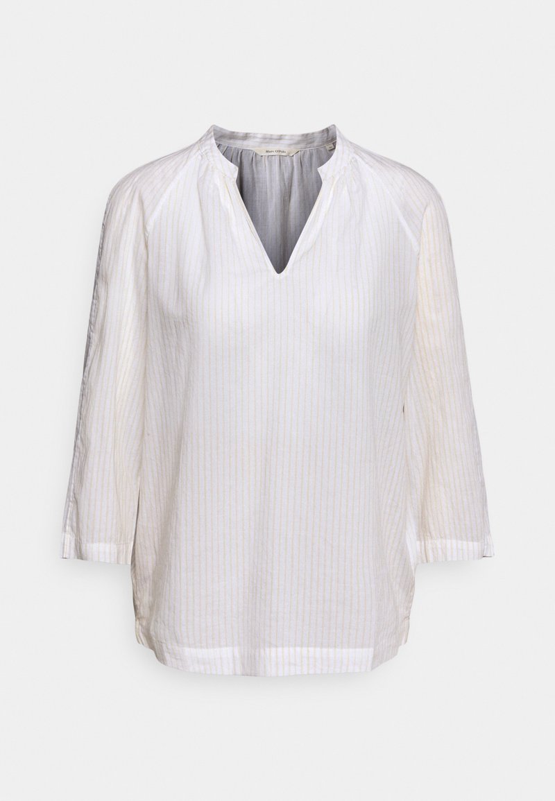Blouse blanche à manches longues avec de discrètes rayures verticales, un col en V et une coupe décontractée.