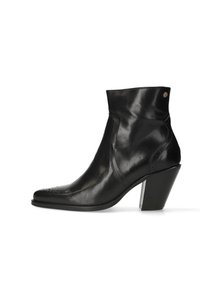 Bottine en cuir noir avec un bout pointu, un design élégant et un talon carré. Avec des coutures décoratives et un petit accent en métal.