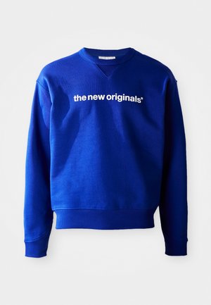 Kék pulóver, puha anyagból készült, kerek nyakkivágással, bordázott mandzsettával, és elöl áll a "the new originals" felirat fehér színben.