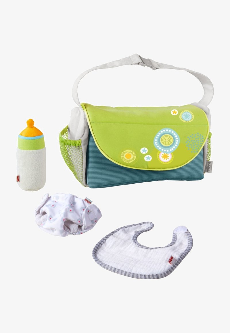 Green and blue diaper bag with decorative accents, includes a soft toy bottle, white diaper with pink dots, and gray-striped bib.