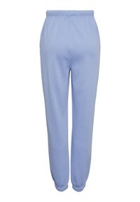 Ljusblå mjukisbyxor i mjukt tyg, med elastisk midja, sidofickor och elastiska muddar vid anklarna.