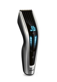 Philips haartrimmer met een elegante zwart-zilveren design, LED-display, gestructureerde grip en een kamopzetstuk voor verstelbare lengtes.