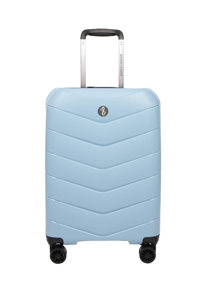 Hard-shell suitcase in light blue with a chevron pattern, extendable silver handle, and four black wheels for mobility.