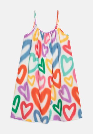 Abito colorato con spalline sottili, caratterizzato da una base bianca con motivi a forma di cuore multicolori in rosa, rosso, blu, verde e arancione. Tessuto morbido.