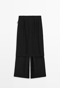 Sorte bukser med vidde i benene og påsyet overdelsnederdel, høj talje og lynlås i siden, vist fladt på hvid baggrund.