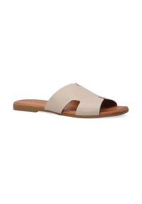 Beige læder slide sandal med udskåret design, flad sål og træindlæg, samt en glat tekstureret overflade.