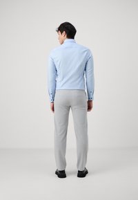 OLYMP Level Five Alkalmi ing - bleu