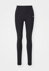 CONTRAST - Leggings - black