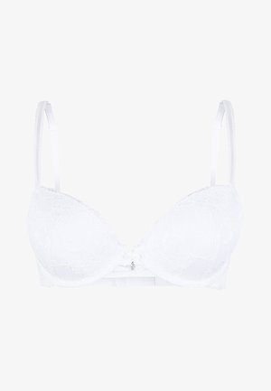 Soutien-gorge en dentelle blanche avec des bonnets moulés, des bretelles réglables et un nœud décoratif au centre. Le motif floral texturé rehausse le design.