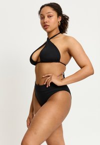 Modibodi MULTIWAY - Haut de bikini - black
