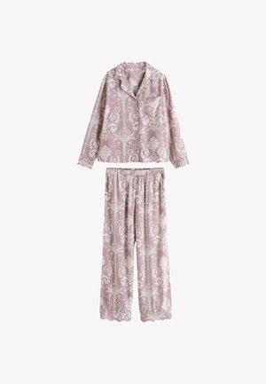 Pink long-sleeve button-up pajama top and matching elastic-waist pants with white floral and scroll patterns.