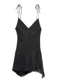 Robe noire sans manches avec des pois blancs, dotée de bretelles fines et ajustables, d'un col en V et d'une ourlet asymétrique. Tissu léger.