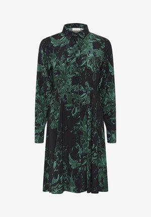 Vestido de manga larga en azul marino oscuro con un patrón floral verde. Presenta un cuello con solapa y cierre de botones en la parte delantera.