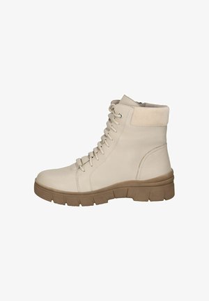 Beige Leder Stiefeletten mit runder Zehenpartie, Schnürung an der Vorderseite, gepolstertem Schaft und einer stabilen braunen Gummisohle mit tiefen Rillen für besseren Halt.
