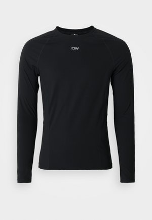 Sort langærmet atletisk skjorte, lavet af strækbart materiale, har rund hals og flade sømme. Lille logo på den øverste bryst.