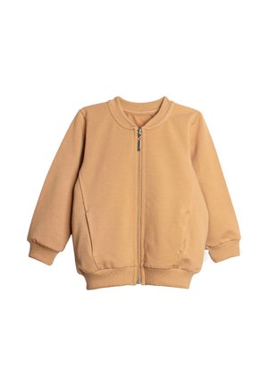 Beżowa kurtka typu bomber na suwak z prążkowanym kołnierzem, mankietami i dołem, z bocznymi kieszeniami i metalowym suwakiem.