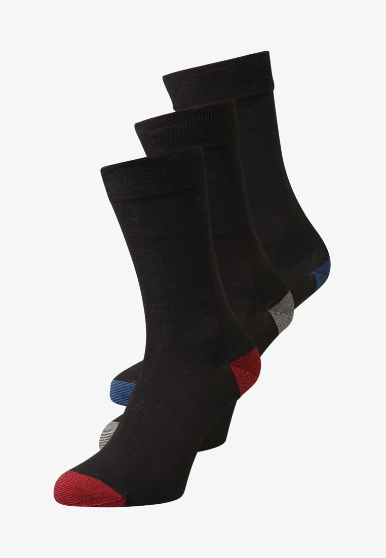 Tre paia di calzini neri con talloni di colore contrastante: rosso, blu e grigio. Realizzati in un tessuto liscio, presentano un orlo a coste.