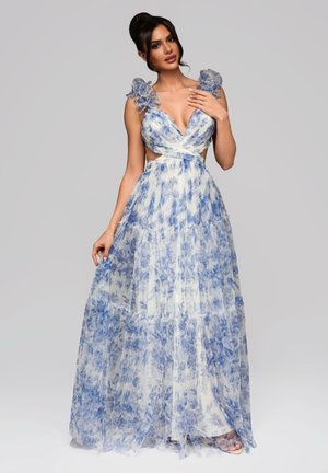 Maxi dress in sheer fabric with blue floral patterns. Features puffed shoulders, deep V-neckline, and layered ruffles at the hem.