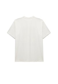 T-shirt en coton blanc à manches courtes, col rond et ourlet droit, avec une texture lisse sans graphiques ni motifs visibles.