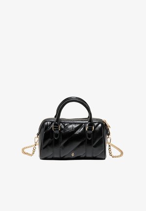 Petit sac à main noir en cuir verni avec double poignée, bandoulière chaîne dorée et fermeture éclair dorée.