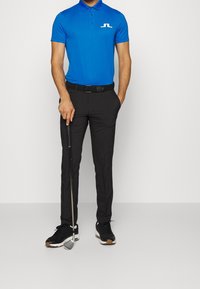 J.LINDEBERG Sports Friluftsbyxor - black