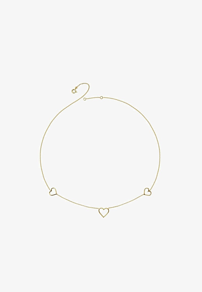 Collar de tono dorado con tres formas de corazón abiertas a lo largo de una delicada cadena. Esta pieza tiene un diseño minimalista con una textura suave.