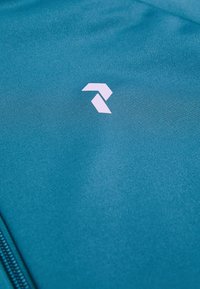 Peak Performance M RIDER - Trainingsjacke - petrol