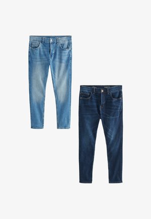 Deux paires de jeans skinny : l'une bleu clair avec des zones décolorées, l'autre bleu foncé avec des détails de frottement subtils, les deux possèdent des poches avant et des passants de ceinture.