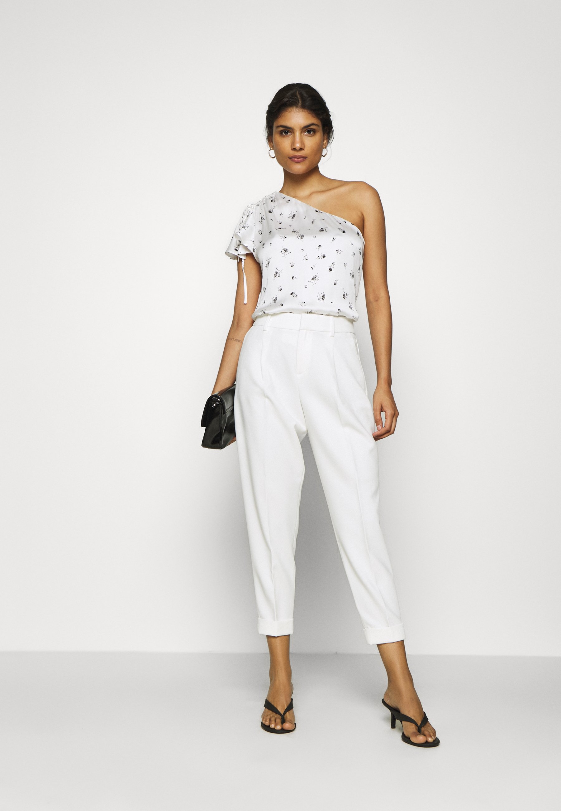 white blouse one shoulder