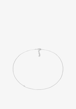 Harmaa ketjun kaulaketju, jossa on herkkä ja hieno muotoilu; varustettu hummerilukolla ja pidennysketjulla säädettävää pituutta varten.