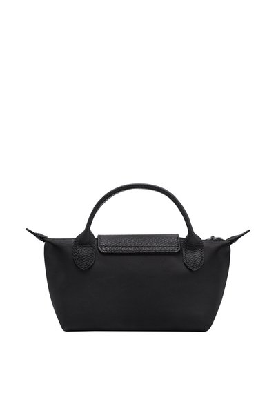 Black small handbag with textured leather handles, a flap with embossed text, and a zipper closure on top.