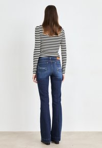 LIU JO PANT AUTHENTIC BEAT - Jean bootcut - blue denim