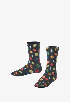 Chaussettes noires ornées de lettres colorées de différentes formes et tailles, avec une texture lisse et une coupe mi-mollet.