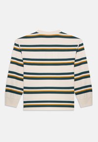 Long-sleeve, cream cotton shirt featuring horizontal stripes in dark green, mustard yellow, and white. High neckline with ribbed cuffs.