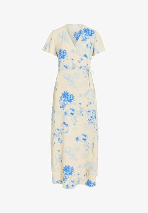Robe portefeuille crème à manches courtes avec imprimé floral bleu, dotée d'une ceinture latérale et d'une longueur midi.