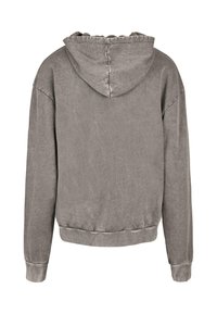 Šedá mikina s kapucí vyrobená z měkkého materiálu. Nabízí uvolněný střih, vroubkované manžety a lem, a hladký, mírně opotřebovaný vzhled.