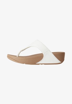 Witte flip-flop sandaal met een getextureerd tan platform. Heeft een snug toe-post en een glad bovenwerk met contrasterende stiksels.