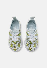 Light blue fabric shoes with a pattern of cartoon trees and stars, white laces, and pull tabs on the heels for easy wearing.